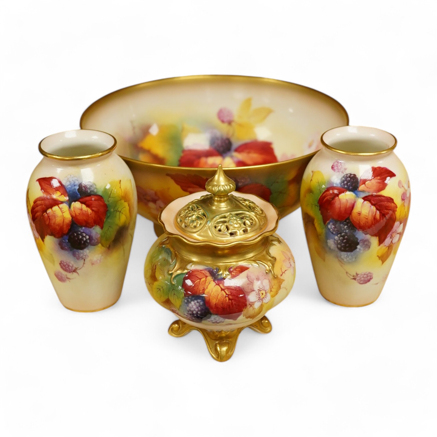 Four pieces of Royal Worcester porcelain hand painted with fruit and flowers by Kitty Blake, largest 18cm wide. Condition - good, bowl with hairline crack